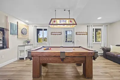 a living room with a pool table in it at Cozy Mountain Retreat 3 Min to Hunter Mountain in Hunter