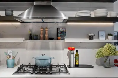 a kitchen stove with a pot on top of it at Modern 2BR Brooklyn Retreat Near Manhattan with Private Backyard in Brooklyn