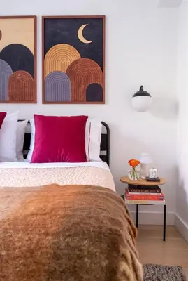 a bedroom with a bed with a pink pillow at Modern 2BR Brooklyn Retreat Near Manhattan with Private Backyard in Brooklyn