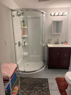 a bathroom with a shower and a sink at 3-bedroom peaceful apartment close to Fairfield University in Fairfield