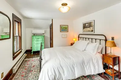 a bedroom with a bed and a green dresser at 2 Mi to Belleayre Mtn! Extended Base in Pine Hill in Pine Hill