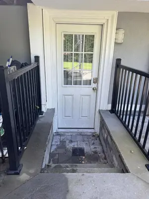 a white door with a window on a house at Curated Suite with Soaking Tub and Walk to Whole Foods in Jericho