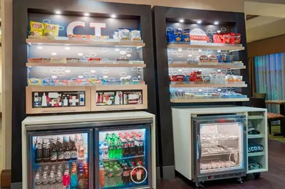 a store with two refrigerators in a store at Hampton Inn Springfield South Enfield in Enfield