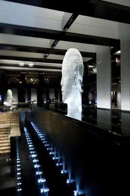 a statue of a head in a building at Hyatt Grand Central New York in New York