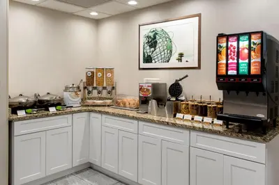 a kitchen with a counter with some food on it at Fairfield Inn by Marriott New York LaGuardia Airport/Flushing in Queens