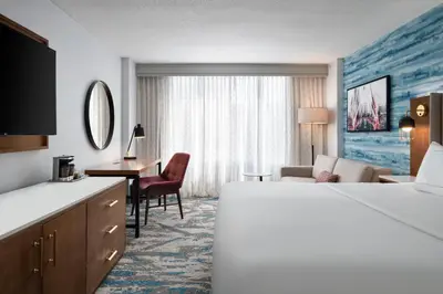 a hotel room with a bed and a desk at DoubleTree by Hilton Hartford Downtown in Hartford