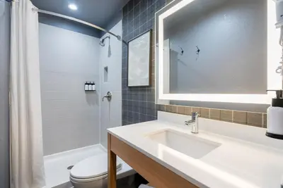 a bathroom with a sink and a toilet at Ardsley Acres Hotel Court in Ardsley