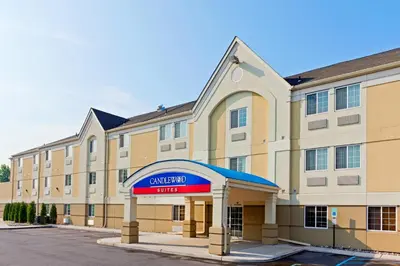 a hotel with a sign in front of a building at Candlewood Suites Secaucus by IHG in Secaucus
