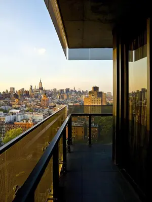 a view of a city from a building balcony at Sixty LES in New York