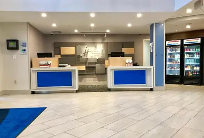 a store lobby with blue counters and boxes at Holiday Inn Express Great Barrington by IHG in Great Barrington