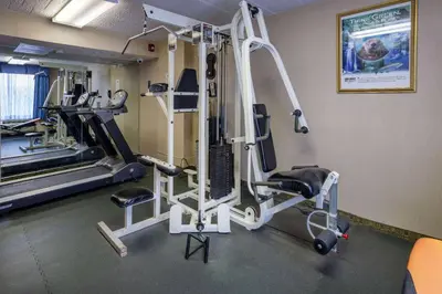 a room with a gym with tread machines at Days Hotel by Wyndham North Bergen in North Bergen