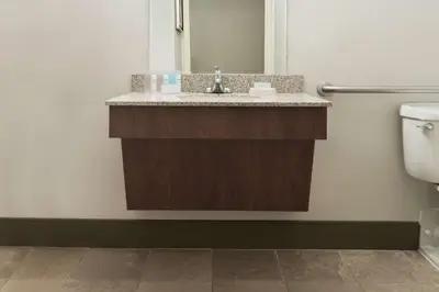 a bathroom with a sink and a toilet at Hampton Inn Danbury in Danbury