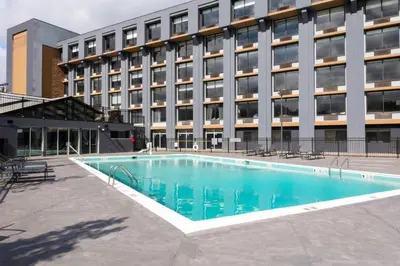 a large swimming pool in front of a building at Fairfield Inn & Suites Springfield Enfield in Springfield