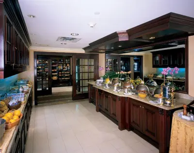 a large kitchen with a lot of food at The Inn At Fox Hollow Hotel in Woodbury