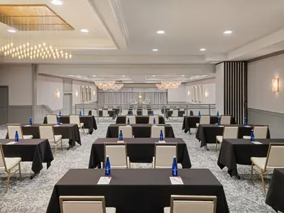 a large banquet hall with tables and chairs at Crowne Plaza Suffern-Mahwah by IHG in Suffern