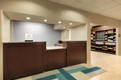 a waiting room with a counter in a hospital at Hampton Inn Denville-Rockaway-Parsippany in Denville