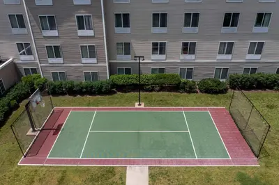 an overhead view of a tennis court in front of a building at Homewood Suites by Hilton Wallingford-Meriden in Wallingford