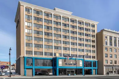 a large hotel building with a blue facade at The Capitol Hotel in Hartford