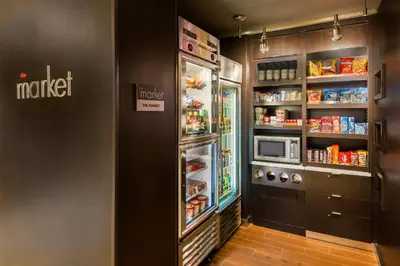 a refrigerator with its door open with food inside at Courtyard by Marriott Danbury in Danbury