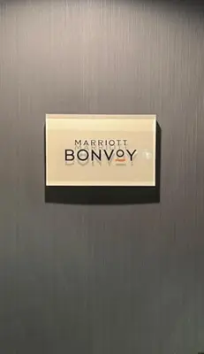 a sign on a door with the name marriott burnaby at Courtyard by Marriott Kingston in Kingston