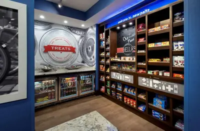 a pharmacy aisle with aries pharmacy display in a store at Hampton Inn by Hilton New Paltz, NY in New Paltz