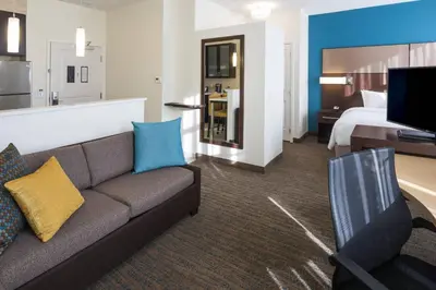 a living room with a couch and a bed at Residence Inn by Marriott Fishkill in Fishkill
