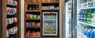 a refrigerator filled with lots of drinks and soda at Residence Inn by Marriott Fishkill in Fishkill
