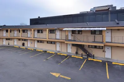 a parking lot in front of a building at Inn At Jericho in Jericho