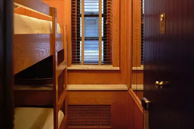 a room with a bunk bed and a window at West Village Eurohostel in New York