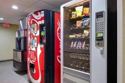 two vending machines in a store with snacks at Quality Inn Oneonta Cooperstown Area in Oneonta
