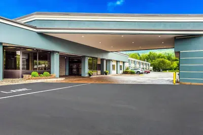 an empty parking lot in front of a building at Quality Inn Oneonta Cooperstown Area in Oneonta