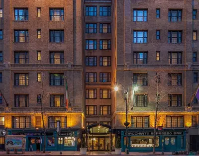 a large brick building in front of a building at Fitzpatrick Grand Central in New York