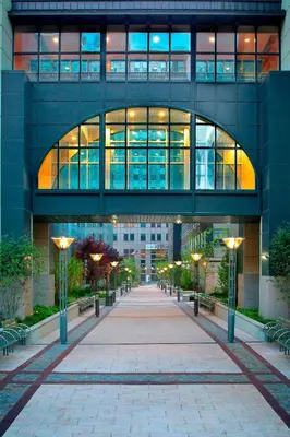 a building with a walkway in front of it at New York Marriott at the Brooklyn Bridge in Brooklyn
