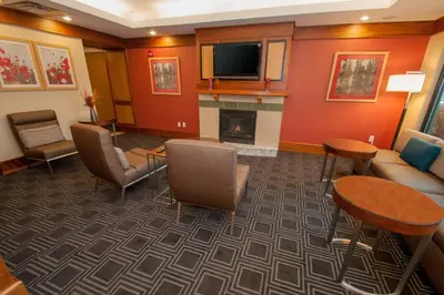 a living room with a couch and a fireplace at TownePlace Suites by Marriott Scranton Wilkes-Barre in Moosic