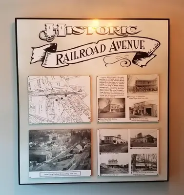a framed picture of the historic railway road archive on a wall at The Railroad Inn in Cooperstown