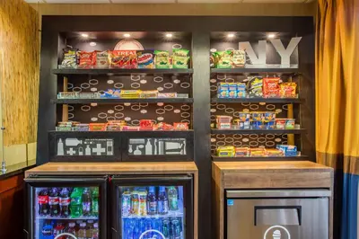 a drink bar with soda machines and drinks at Hampton Inn Fishkill in Fishkill