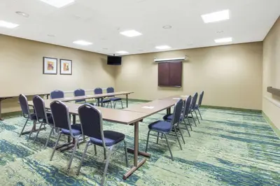 a conference room with a table and chairs at Hampton Inn & Suites Albany-Airport in Latham