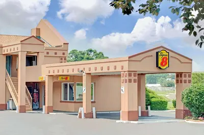 a mcdonalds building with a fast food restaurant at Super 8 by Wyndham Milford/New Haven in Milford
