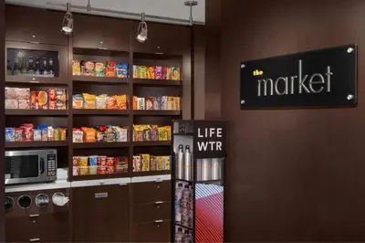 a store with a shelf of food and a sign at Courtyard by Marriott Mahwah in Mahwah