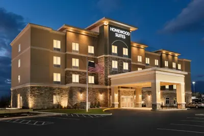 a hotel with a sign that reads hampton inn at Homewood Suites By Hilton Hartford Manchester in Manchester