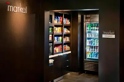 a refrigerator filled with lots of drinks in a store at Courtyard By Marriott Hartford Windsor Airport in Windsor