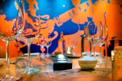 a group of wine glasses sitting on a table at Trumbull Marriott Shelton in Trumbull