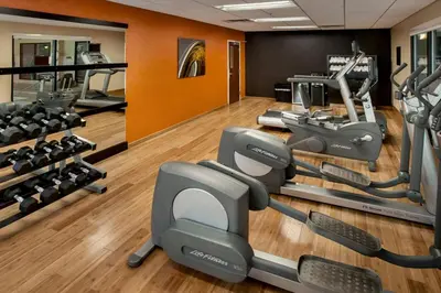 a gym with treadmills and cardio machines at Courtyard Parsippany in Parsippany