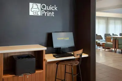 a computer sitting on a desk in an office at Courtyard by Marriott Rye in Rye