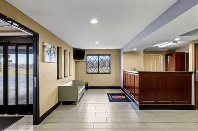 a hallway of a hospital with a waiting room at Super 8 by Wyndham Amsterdam in Amsterdam