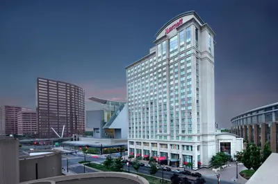 a tall white building with a sign on top of it at Hartford Marriott Downtown in Hartford