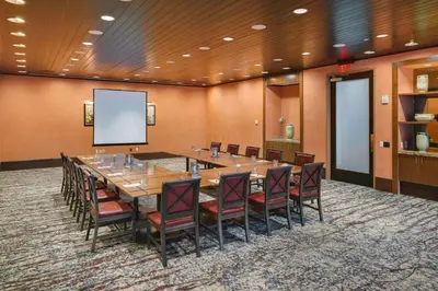 a large conference room with a large table and chairs at Hartford Marriott Downtown in Hartford