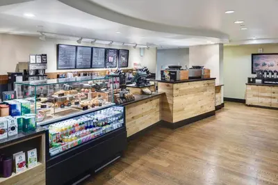 a store with a counter with food and drinks at Hartford Marriott Downtown in Hartford
