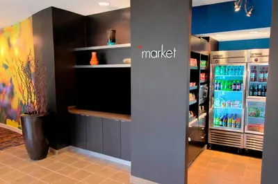 a grocery store with a refrigerator with drinks in it at Courtyard Rockaway-Mount Arlington in Mount Arlington