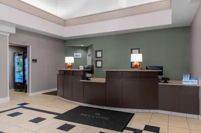 a lobby of a hotel with a reception desk at Residence Inn by Marriott Yonkers Westchester County in Yonkers